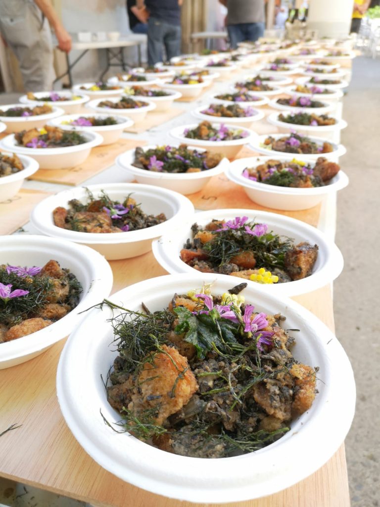 Tasting of meals made with wild vegetation during "Gastronomic Day of Forgotten Plants" in Igualada (Catalonia) organized by the "Eixarcolant" group.