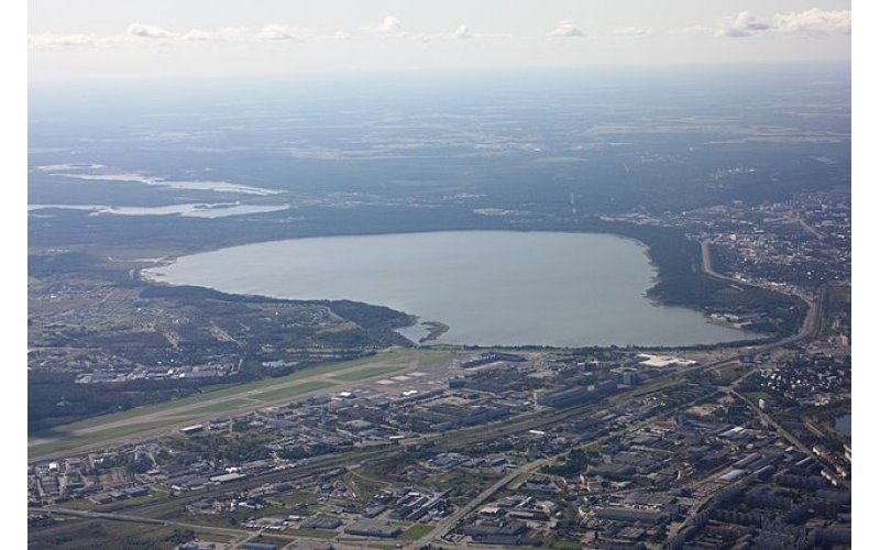 Aerial view of Tallinn with buildings and a large lake