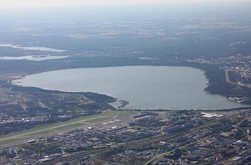 Aerial view of Tallinn with buildings and a large lake