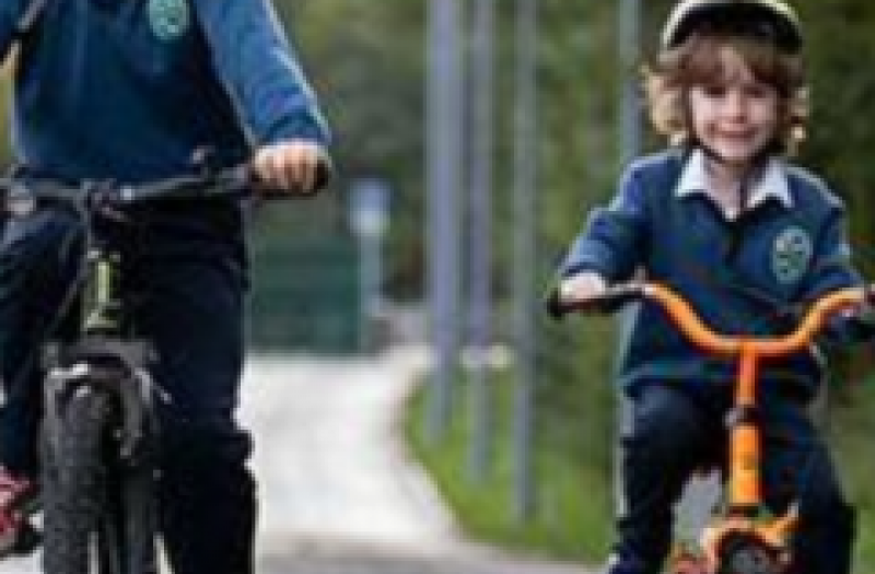 Two children cycling