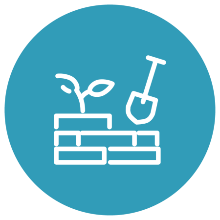 peat extraction icon - spade shovelling into bricks with plant growing out of the top