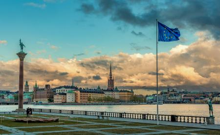 EU flag on a city backdrop