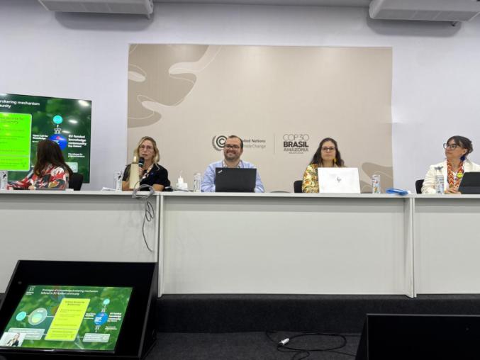 Five panelists at COP30